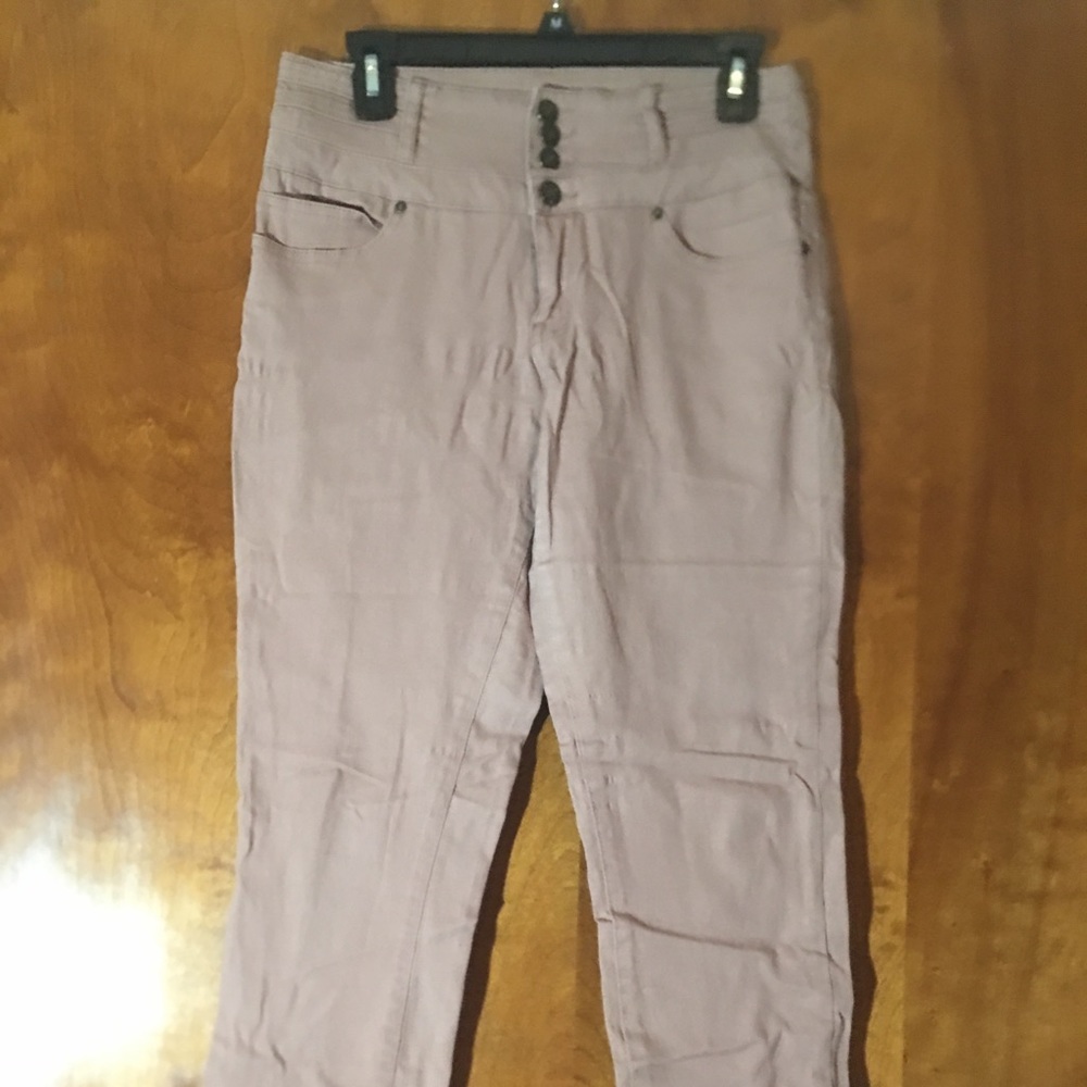 Soft pink colored skinny jeans